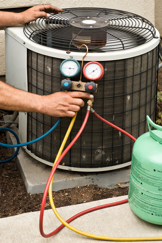 5 Air Conditioning Problems You Should Know About 1 Air conditioner repairman charging or checking an AC unit with a Freon AC Refrigeration Charging Manifold Gauge Kit.