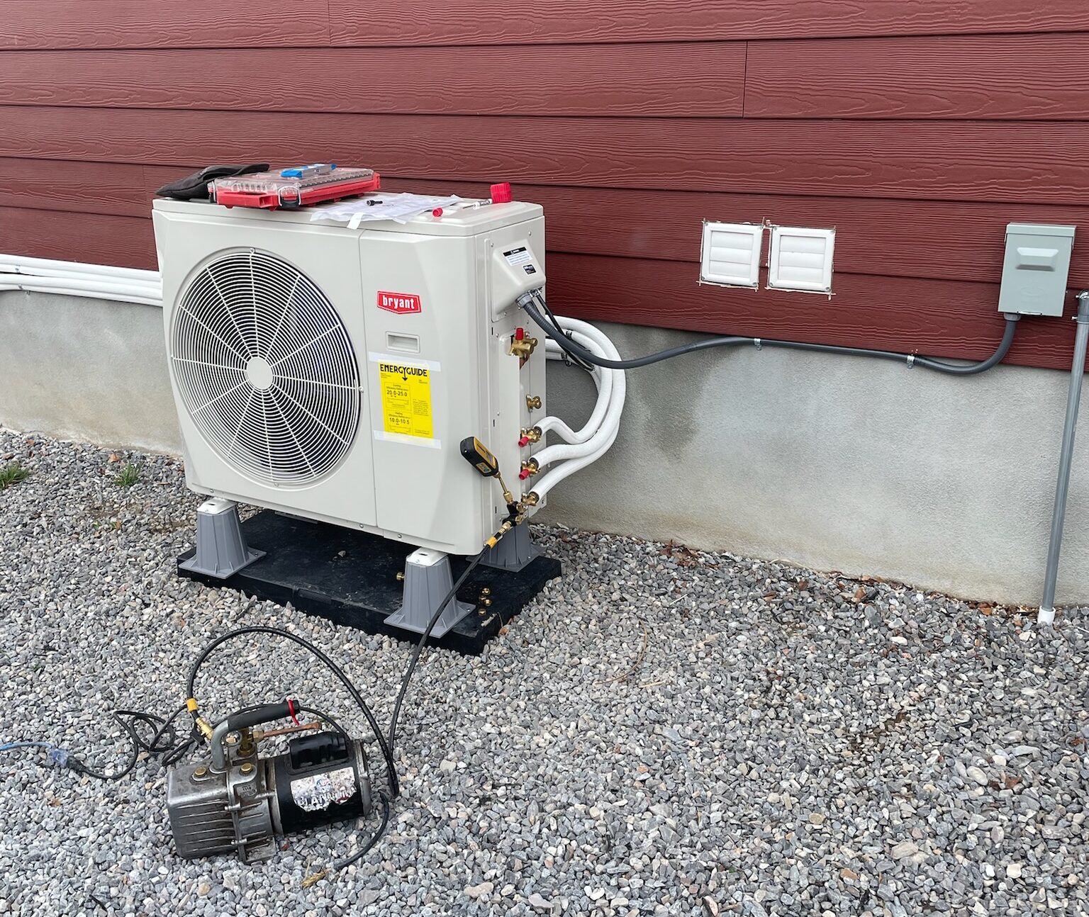 HVAC technician performing professional AC tune up in Sandy UT