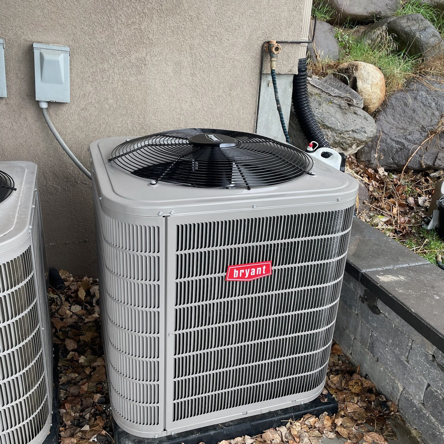 HVAC technician performing an AC inspection in Salt Lake City, UT